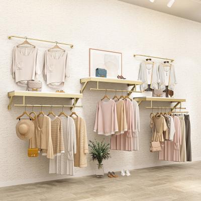 China For Shop Commercial Wall Mounted Hanger Rack Wall System For Clothing Store Display for sale