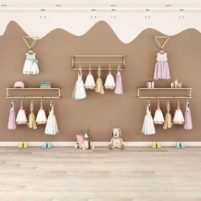 China For Clothing Store Stainless Steel Wall Display Racks Hanger Wall Mounted Gold Wall Mounted Clothes Rack For Clothing Store for sale