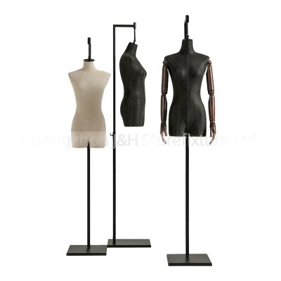 China Fiberglass Metal Base Half Body Torso Mannequin Boutique Headless Hanging Mannequin With Wooden Hand for sale