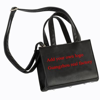 China 2022 High Quality Real Guangzhou Factory Protect Black Custom People Embossed New Words Lady Women Mini Handbag Shoulder Crossbody Bag for sale