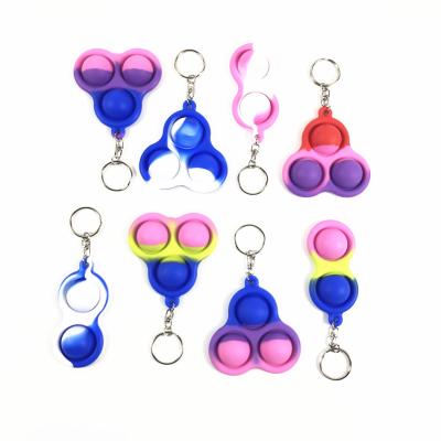 China Mini Silicone Pop Push Bubble Wiggle Toy Silicone Soft Key Ring for sale