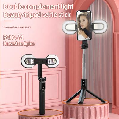 China Fold Up 360 Degree Rotation Selfie Stick Tripod With Fill Light Phone Tripod Holder With Wireless Remote for sale