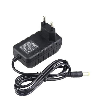 China Universal Laptop/Tablet/Tablet/LED light/CCTV Camera Wall 12W Charger 5V 2A DC to AC Adapter 5521 Connector for CCTV Camera for sale