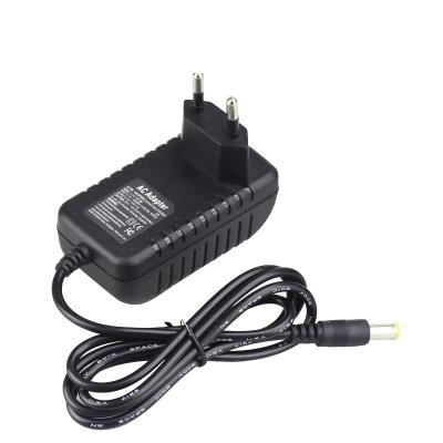 China MP3/4 Wholesale Hot Selling Items 12W Wall Mount AC Power Adapter 5V2A Universal Charger With ROHS FCC CE Certify for sale