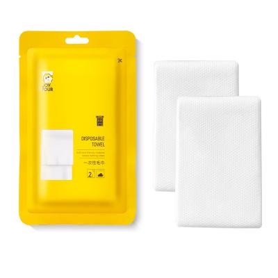 China Child-Proof 2pcs disposable towel 70*30CM Individually packaged hotel hotel travelling portable compressed towel for sale