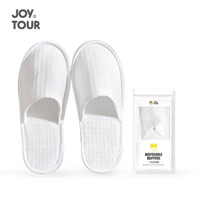 China Disposable Customised Spa Guests Comfortable White Four Seasons Bathroom Soft Slippers Hotel Disposable Slippers for sale