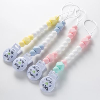 China Baby Teething Baby Care Products Customized Silicone Baby Pacifier Chain Plastic Pacifier Holder Clips for sale