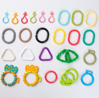 China Plays Many Colors and Design Baby Toy Plastic Ring Seal Ring Baby Teether Ring Links for sale