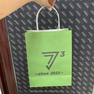 China Recycled Materials White Kraft Paper Handbag Shopping Clothing Paper Bag Food Grade Material With Cheap Price White Kraft Paper Bag for sale