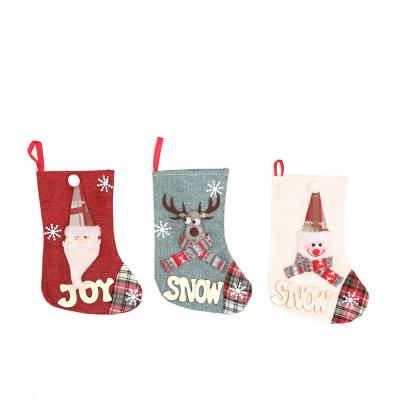 China Christmas Decoration Supplies Stockings Santa Elk Fabric Gift Socks Beautiful Xmas Sack Great for Kids Fireplace Tree Christmas Decoration for sale