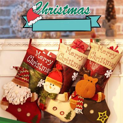 China Christmas Decoration Supplies Christmas Stocking Knocks Fireplace Hanging Stockings Plush Personalized Party Home Decoration with Snowman Santa Elk Bear for sale