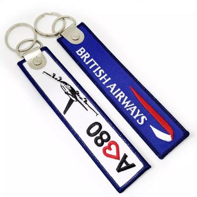 China China Cheap Flight Indicators Custom Made Cloth Double Sided Motion Car Logo Embroidery Keychain for sale