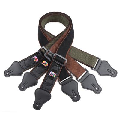 China Classic Professional Guitar Strap Manufacturer Hot Selling 3 Picks Pocket Ends Cotton Leather Guitar Strap for sale