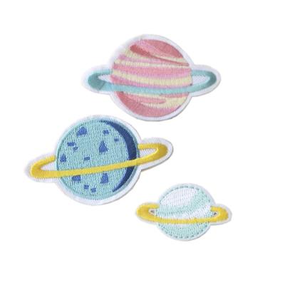 China 3D Wholesale Customized 3D Around The Planet Astronaut Embroidery Patches For Apparel for sale