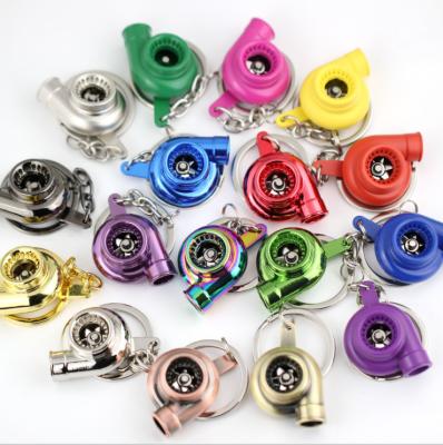 China New arrival car modification parts blade environmental friendly turbo pattern rotary key chain for sale