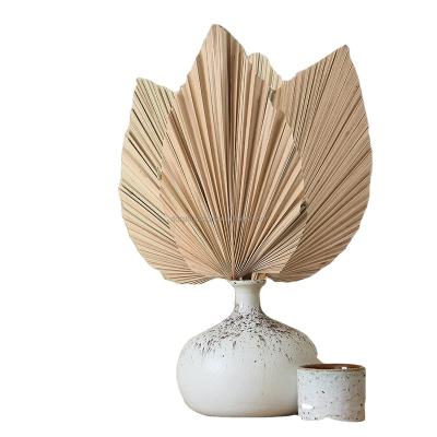 China Natural Touch 6 Pieces Boho Decor Heart Shaped Dry Palm Fans Palm Leaves Pierced Natural Dried Palm Leaves For Pampas Bouquet Weddings House Party for sale