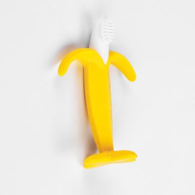 China Other New Design Banana-shape Baby Teether Food-Grade Silicone Soft Toothbrush for sale