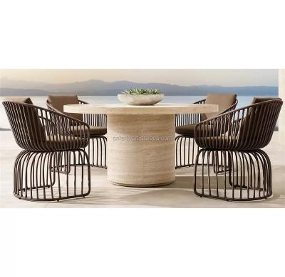 China 2022 Design Contemporary Outdoor Furniture Garden Dining Round Dining Table Set And Wicker Chairs for sale