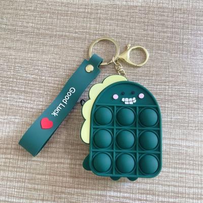 China Mini Cute Dinosaur Stress Relief Hot Selling Eco-friendly Material Small Push Noise Bubbles Silicone Coin Purse Busy Person Toy for sale