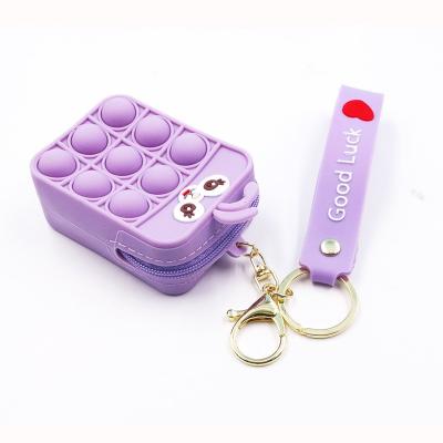 China Fashion Wallet Toy Zipper Simple Key Ring Purse Cartoon Silicone Moving Person Toys Eco-friendly Material Rat Killing Pioneer Moving Person Toys for sale