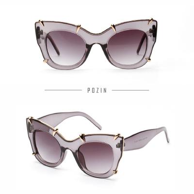 China Fashion Sunglasses Pink High Quality Plastic Promotional Girl Eagle Claw Oversized Cat Eye Sunglasses for sale