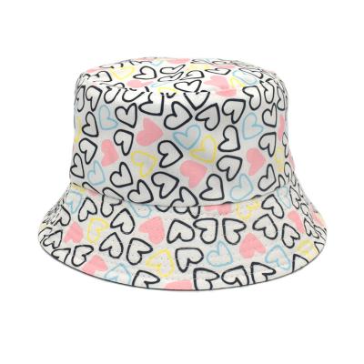 China Dobby Summer Sun-shading Outdoor Polka Dot Print Ladies Fashion Double Sided Bucket Hat For Adult for sale