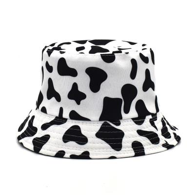 China Hot selling design double-sided print cow sunshade summer dobby summer outdoor bucket hat for women for sale