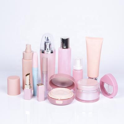 China Spray Pink Wholesale Popular Color Plastic Cosmetic Bottles Skin Care Bottles Set for sale