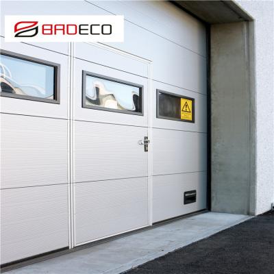 China Windproof Industrial Overhead Sectional Door For Industrial Warehouse Door With Window Puertas Industriales for sale