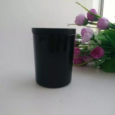 China Who respects the environment. stocked hotsale shinning black color recycled glass candle jars with cork lids for sale