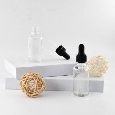 China Personal Care Essential Oil Packaging 5ml 10ml 15ml 20ml 30ml 50ml 100ml Clear Dropper Glass Bottle With Child Protective Cap for sale