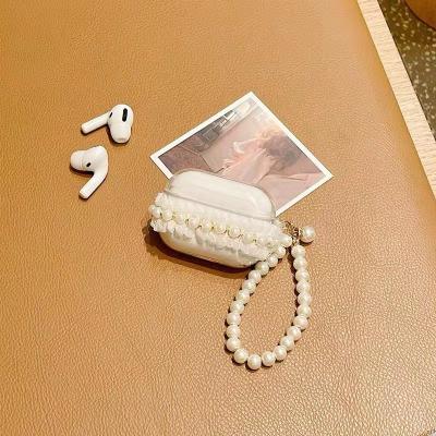 China For High Quality Earphone Sublimation Silicone Earphone Storage Case Fashion Clear Lace Silicone Earphone Case With Pearl Chain for sale