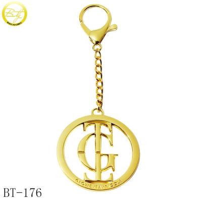 China Custom Hollow Shape Nickel/Lead Free Key Chains Making Purse Hardware Around Logo Gold Hang Tags With Clasp for sale