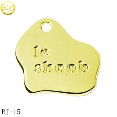 China Irregular Shape Designer Garment Nickel/Lead Free Hang Tags Gold Plated Alloy Letter Pendant For Hair Decoration for sale