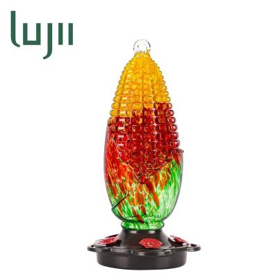 China LUJII Auto Corn Shaped Hummingbird Feeder For Outdoor Hanging Hand Blown Glass 25 fl.oz With Hanging Hook Ant Moat Perch for sale