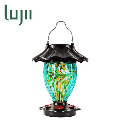 China LUJII Auto Solar Powered Color Changing Hummingbird Feeder For Outdoor Hanging Hand Blown Glass 32 fl.oz With Hanging Hook Ant Moat for sale