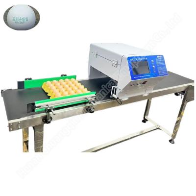 China 220v 50hz Egg Stamping Machine Inkjet Egg Coding Machine 50000 Eggs/H for sale