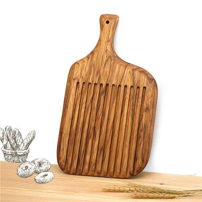 China Good quality sustainable wooden chopper for kitchen counter top fruit vegetable and pizza decorative cutting board for sale