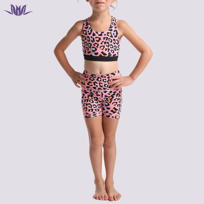 China Eation 2022 Kid Leopard Print Yoga Hot Selling Recycled Anti-UV Breathable Crop Back Cross Top Pocket Short Legging Set For Girl for sale