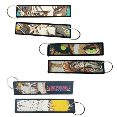 China Promotion Gift Keychain Souvenir Promotional Safety Wallet Jet Tag Accessories Embroidery Key Chain Gift Custom Japan  Anime Embroidered Keychain for sale