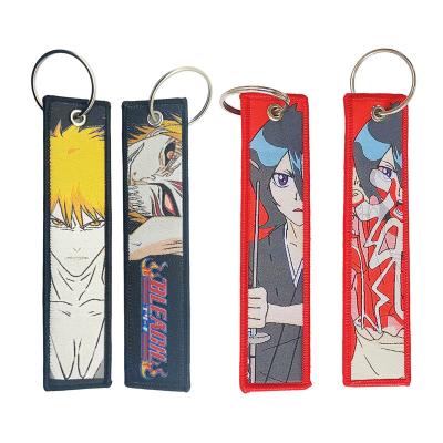 China Daily Life Wholesale New Fashion Custom Logo Embroidery Anime Cartoon Keychain Lanyard Fabric Embroidered Key Tags for sale