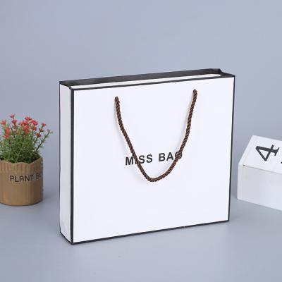 China High Recyclable Logo Horizontal Shopping White Kraft Strong Hot Stamping Paper Bag With Cotton Rope Handles for sale