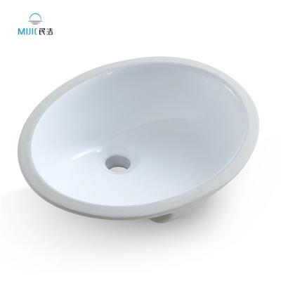 China Modern oval under counter basin ceramic bathroom sink sink undermount bathroom under counter sink for sale