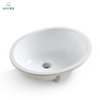 China Factory Modern Ceramic Sanitary Ware Accessories Directly Under Oval Wash Basin Counter Bowl Undermount Bathroom Sink for sale