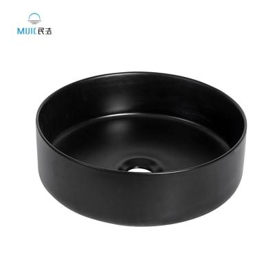 China Matt Black Counter Top Art Modern Sanitary Ware High Grade Lavatory Bathroom Black Ceramic Basin Sinks for sale