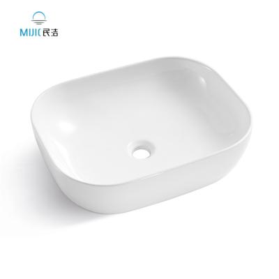 China Modern Sanitary Ceramic Sink Countertop Bathroom Ware Shiny White Style Wash Basin for sale