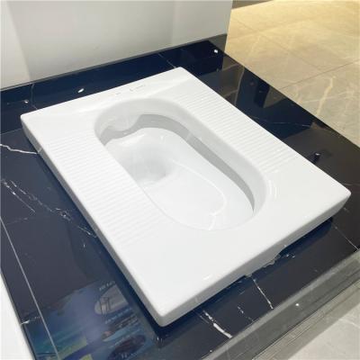 China New Modern Ceramic Public Toilet Ware Model Sanitary Wc Squatting Pan Ceramic Squatting Pan Toilet for sale