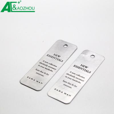 China Sustainable Cool Design Silver Oblong Shape Jeans Label Tag For Man for sale