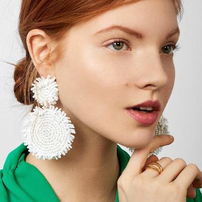 China Fashion Duoying OEM Exaggerated Pearl Rice Border Hot Selling Handmade Creative Earrings for sale