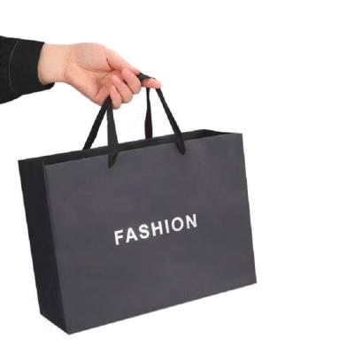 China Environmental protection hot sale professional custom made white shopping paper bag with logo for sale